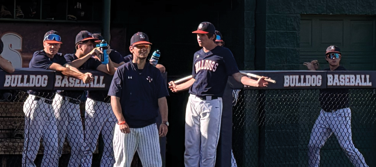 A group of baseball players are standing on a baseball field. Contenido generado con IA