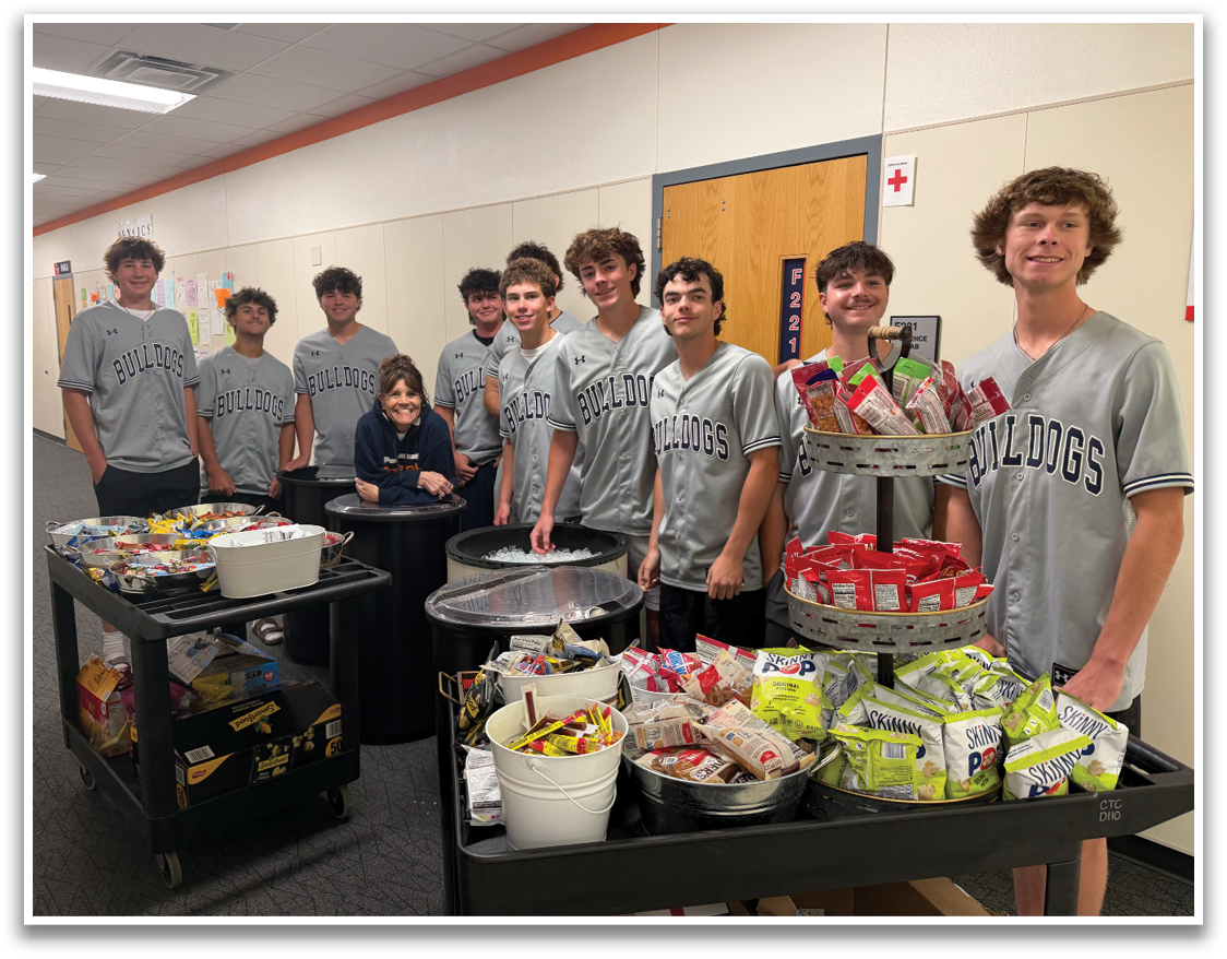 A group of young men are standing in front of a table with a tray of snacks. Contenido generado con IA