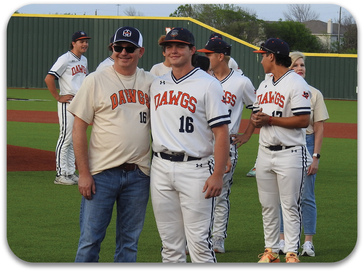 A man and a boy stand on a baseball field, posing for a picture. Contenido generado con IA