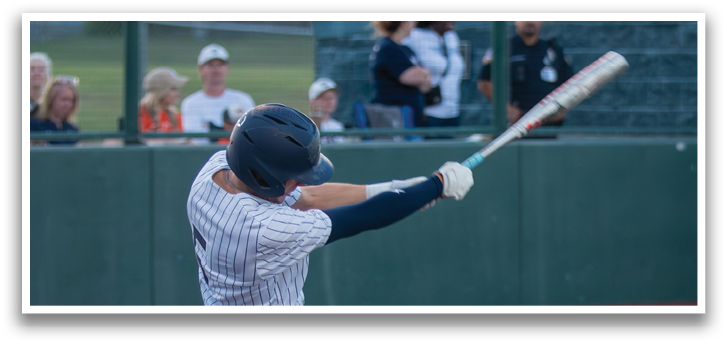 A baseball player is swinging a bat at a ball. Contenido generado con IA