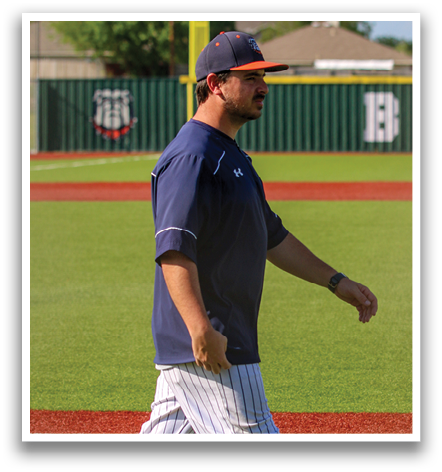 A man wearing a blue shirt and white pants is walking on a baseball field. Contenido generado con IA