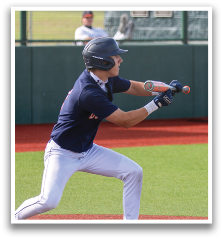 A baseball player in a blue and white uniform is swinging a bat at a ball. Contenido generado con IA