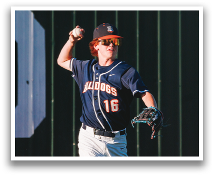 A baseball player wearing a blue and white uniform is running on the field. Contenido generado con IA