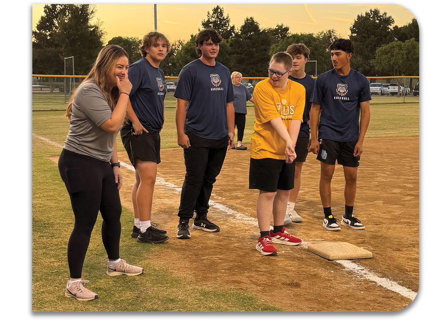 A group of people are standing on a baseball field, with one person holding a baseball bat. Contenido generado con IA