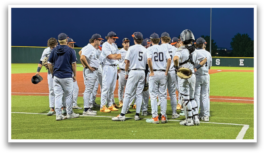 A group of baseball players huddled together on a field. Contenido generado con IA