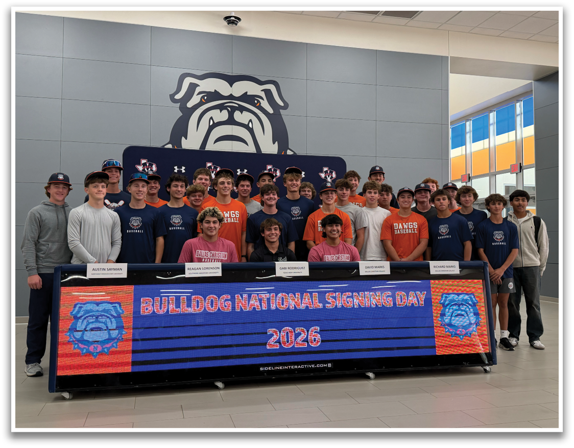 A group of young men are posing for a photo in front of a sign that says “BULLDOG NATIONAL SIGNING DAY 2026". Contenido generado con IA