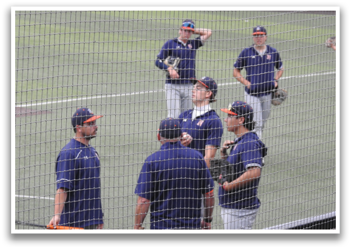 A group of baseball players standing on a field, some holding bats. Contenido generado con IA