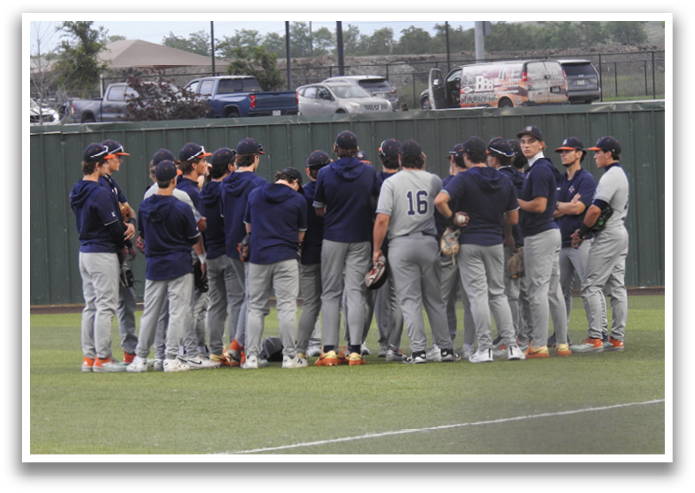 A group of baseball players huddled together on a field. Contenido generado con IA