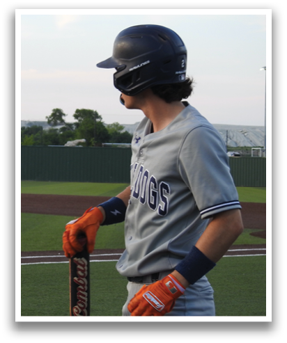 A baseball player holding a bat on the field. Contenido generado con IA