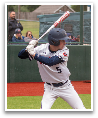 A baseball player in a white uniform is swinging a bat at a ball. Contenido generado con IA