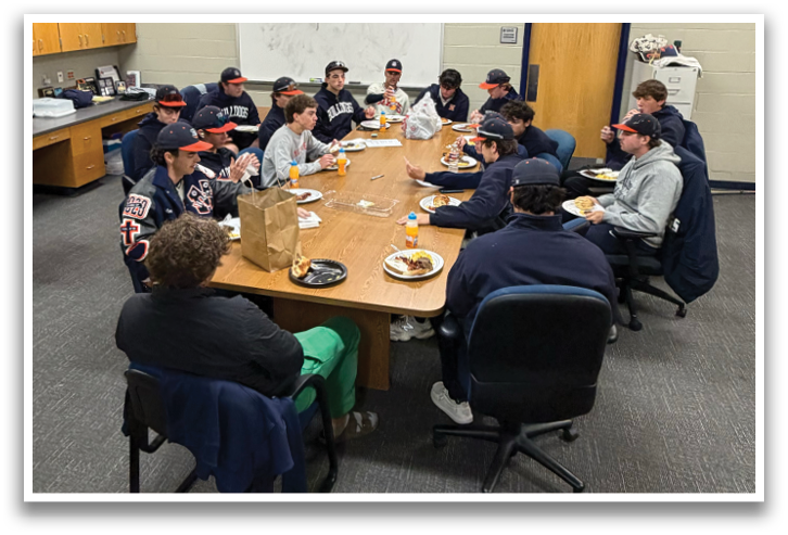 A group of people are sitting around a table in a conference room. Contenido generado con IA