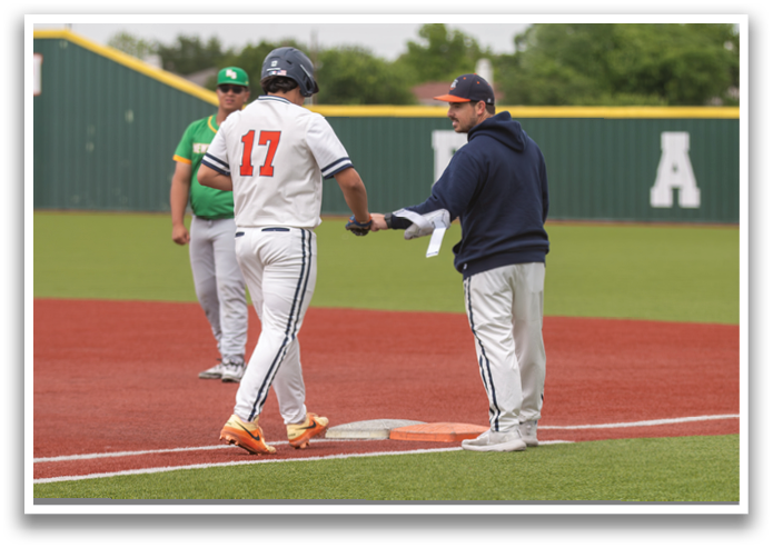 A baseball player is walking off the field with his coach. Contenido generado con IA