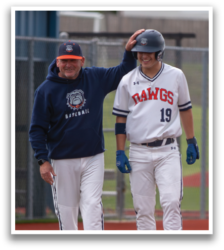 Two men are standing on a baseball field, one of them wearing a baseball uniform. Contenido generado con IA