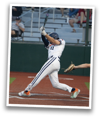 A baseball player is swinging a bat at a ball. Contenido generado con IA