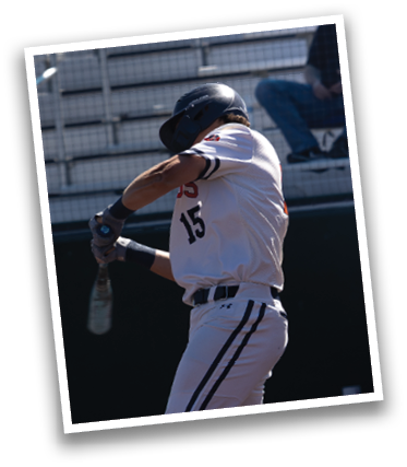 A baseball player in a white uniform is swinging a bat at a ball. Contenido generado con IA