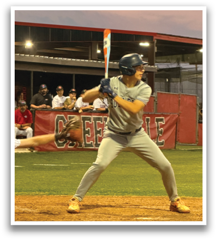 A baseball player is swinging a bat, attempting to hit a ball. Contenido generado con IA