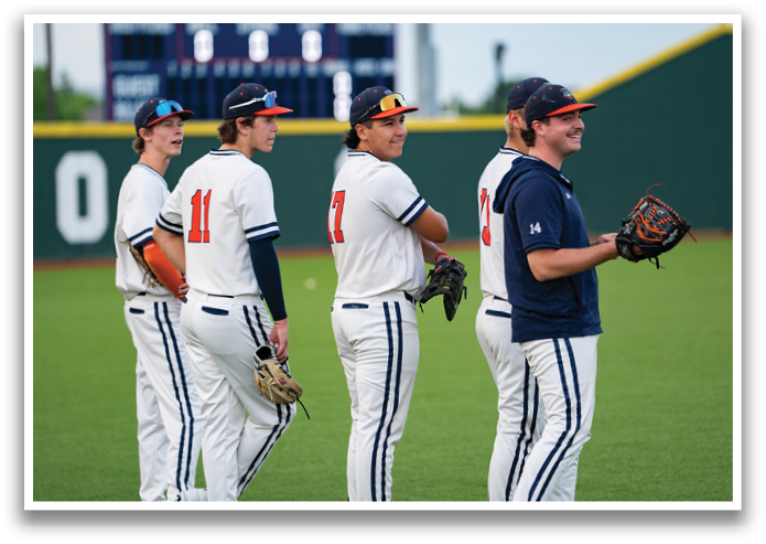 Baseball players standing on a field, wearing uniforms and holding gloves. Contenido generado con IA