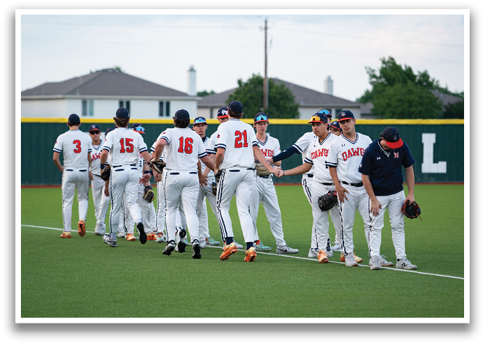 A group of baseball players wearing numbered jerseys are standing on a baseball field. Contenido generado con IA