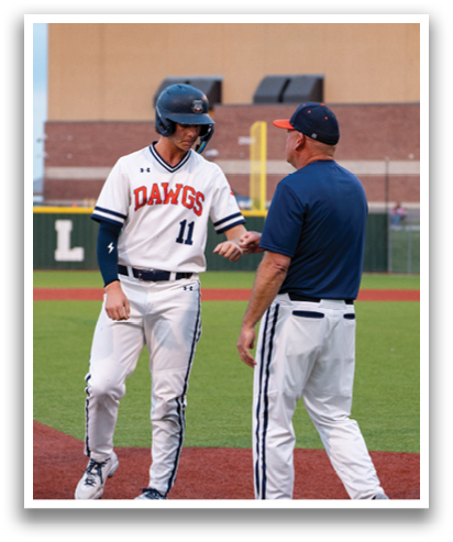 Two men in baseball uniforms are talking to each other on the field. Contenido generado con IA