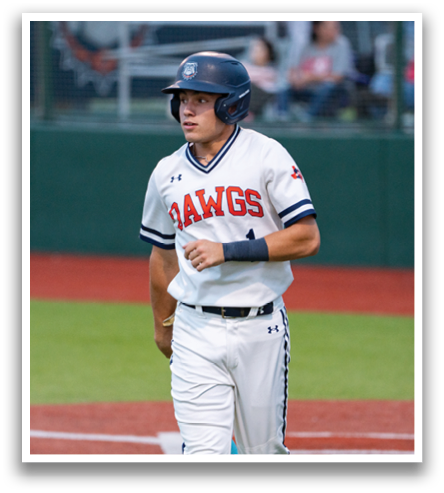 A baseball player wearing a helmet and a white uniform is walking on the field. Contenido generado con IA