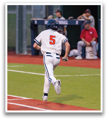 A baseball player wearing a number 5 jersey is running to first base. Contenido generado con IA