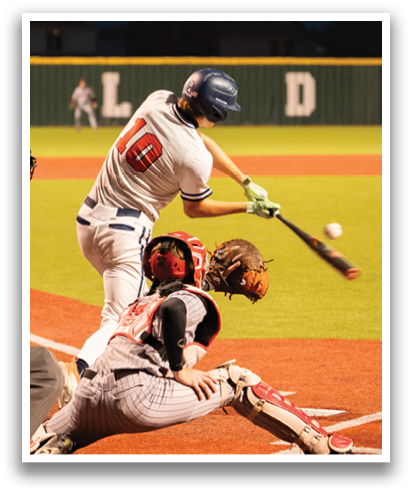 A baseball player is swinging a bat at a ball during a game. Contenido generado con IA