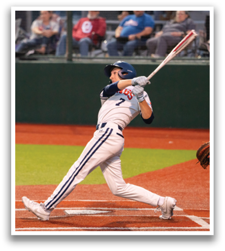 A baseball player is swinging a bat at a ball, while a catcher is ready to catch it. Contenido generado con IA