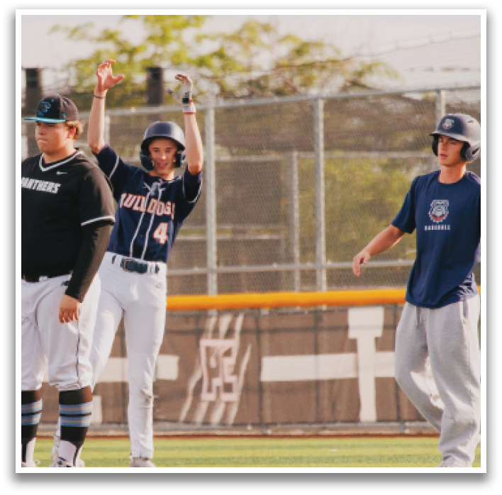 Three baseball players are on the field, one of them is holding his arms up in the air. Contenido generado con IA