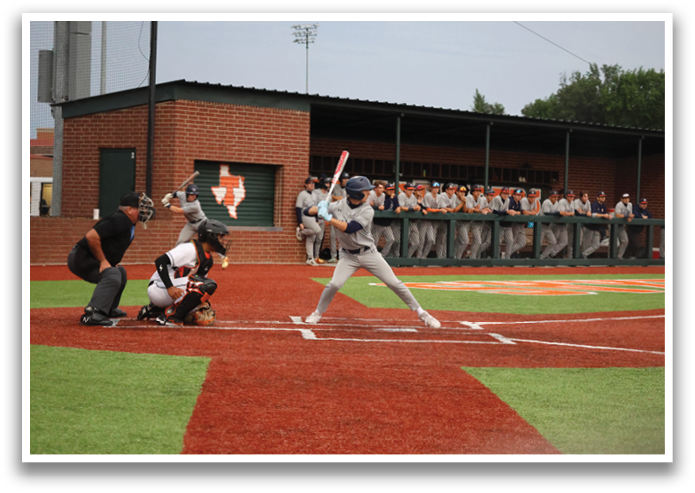 A baseball player is swinging a bat at a ball during a game. Contenido generado con IA