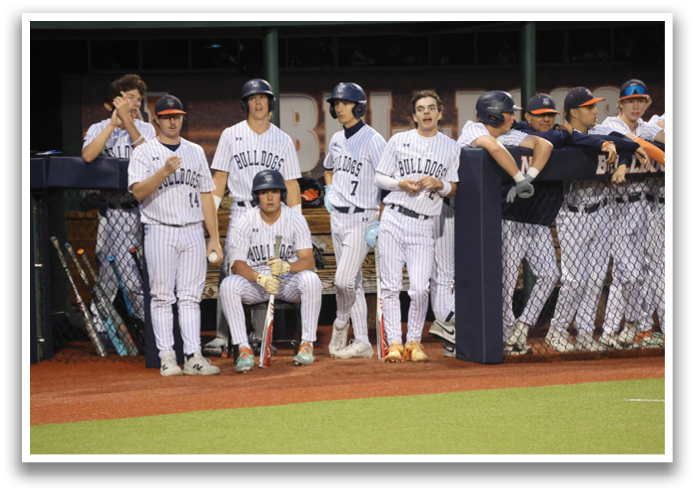 A group of baseball players are standing on a field, some of them wearing helmets. Contenido generado con IA