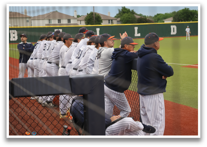 A group of baseball players are standing on a field, some of them wearing helmets. Contenido generado con IA