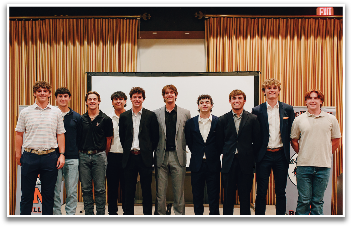 A group of young men in suits and ties pose for a picture. Contenido generado con IA