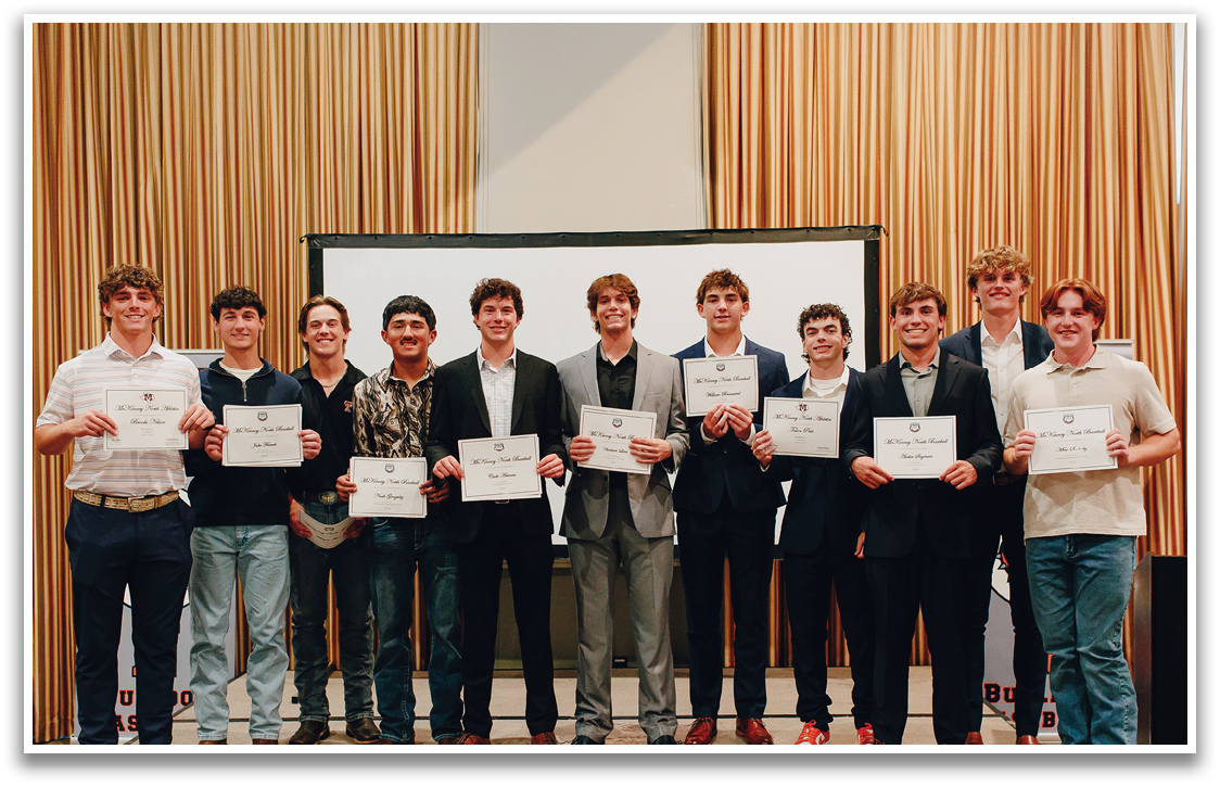 A group of young men wearing suits and ties stand in front of a screen. Contenido generado con IA