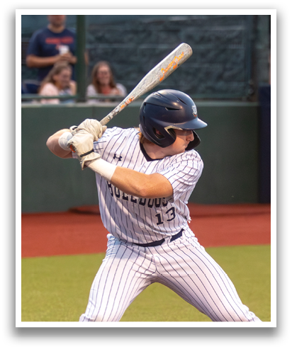 A baseball player is swinging a bat at a ball during a game. Contenido generado con IA