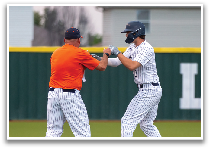 Two baseball players are shaking hands on the field. Contenido generado con IA