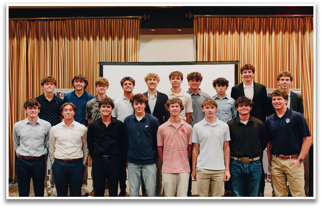 A group of young men pose for a picture in front of a screen. Contenido generado con IA