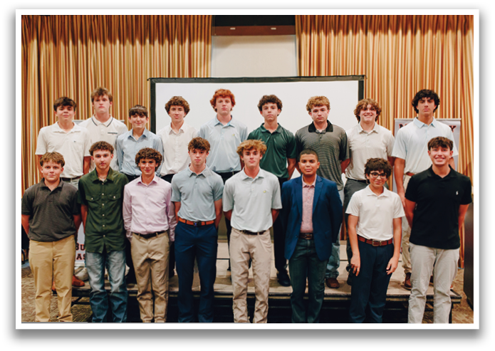A group of young men in a classroom pose for a picture. Contenido generado con IA
