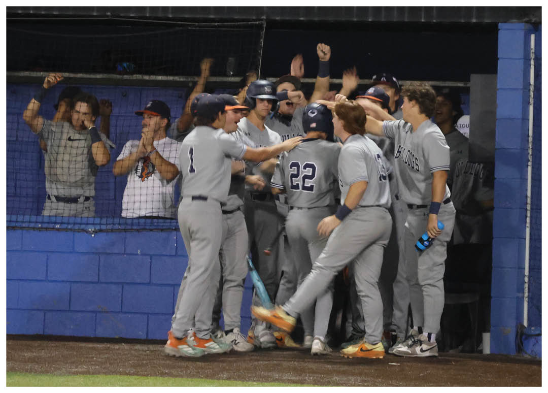 A baseball player is walking away from the field while holding a bat. Contenido generado con IA