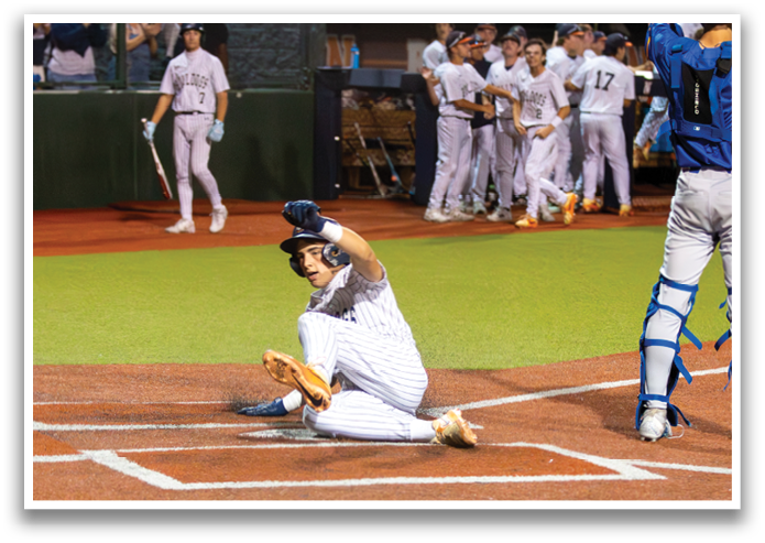 A baseball player is kneeling on the ground with his hands on his head. Contenido generado con IA