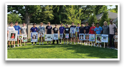 A group of young people stand on a grassy field, holding up signs. AI generated content
