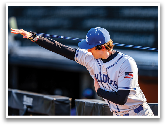 A group of baseball players wearing blue hats and white uniforms are standing together on a field. AI generated content