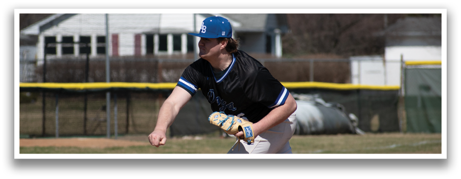 A baseball player in a black shirt and blue socks is pitching a ball on a field. AI generated content