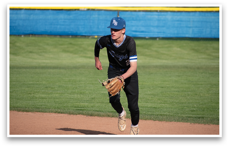 A baseball player running on the field. Description generated by AI