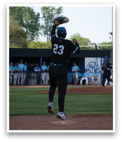 A baseball player is jumping in the air to catch a ball. Description generated by AI