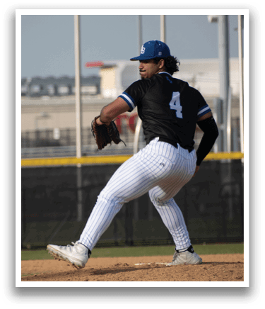 A baseball player in a black and white uniform is pitching a ball. Description generated by AI