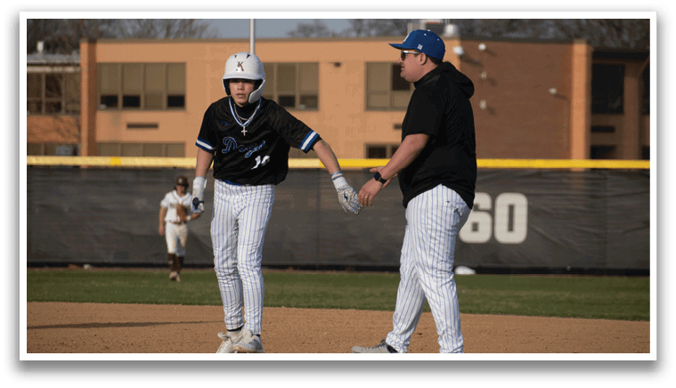 A baseball player is stepping on home plate. Description generated by AI