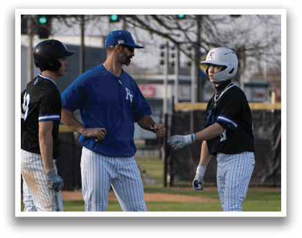 Baseball players on a field. Description generated by AI