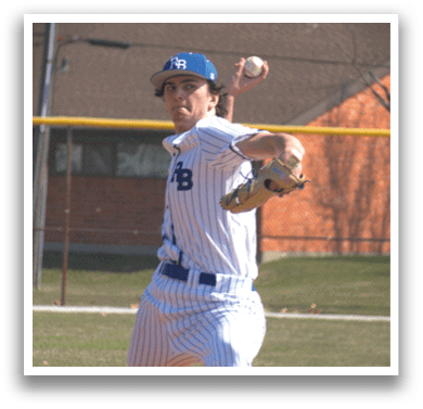 A baseball player in a blue and white uniform is pitching a ball. Description generated by AI