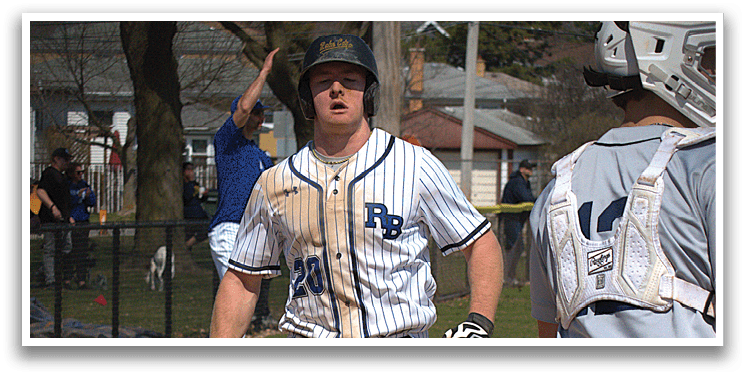 A baseball player running to the base. Description generated by AI