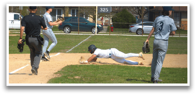 A baseball player slides into a base. Description generated by AI